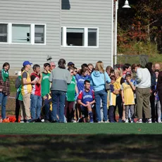 Sunshine and smiles at our Fall Family Field Day... perfect weather for pumpkin carving, line dancing, and field games! #riverviewschool #familyfieldday